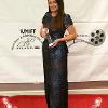 LA Director Kathleen Davison collects her awards on the red carpet in Washington DC in LJH Couture
